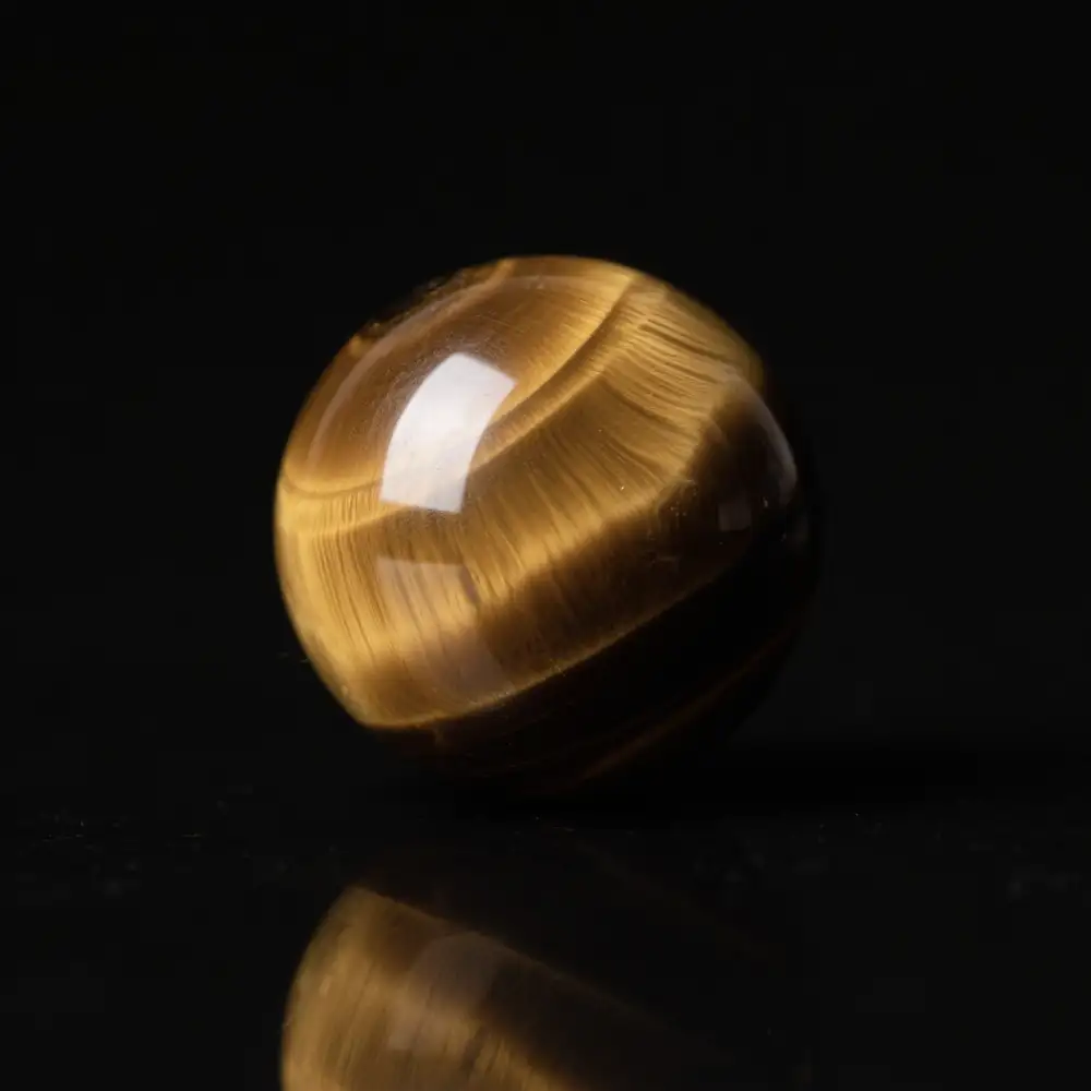 Earth element natural crystal sphere (tiger eye stone) for grounding energy jewelry, part of the five elements crystal collection