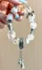Multi-crystal bracelet worn, silver & crystals arrange, metal-water energy shows ethereal layers