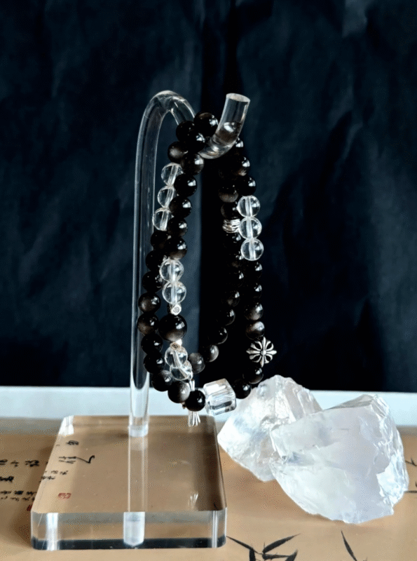 Silver obsidian & clear quartz double bracelet on display! Edgy black - silver vibe, maxing out luxury feels