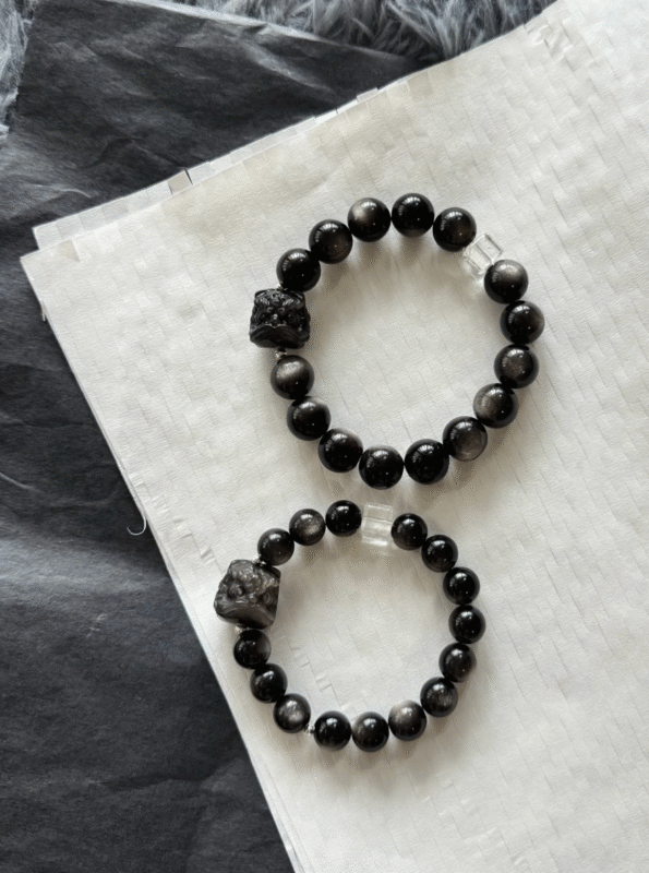 Silver obsidian bracelet on wrist! Lion charm + clear quartz, ideal couple’s match