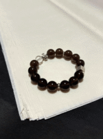 Detail of Ice Obsidian Bracelet, Silver Charms Mix with Black Beads, Water-Metal Energy Shows Minimalist Luxury