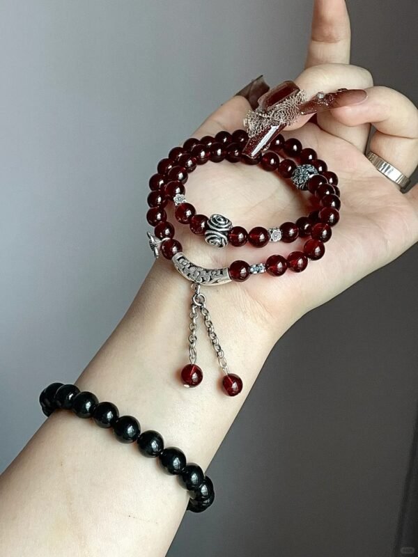 Layered garnet double-strand bracelet with silver, red & black contrast, fire-metal synergy boosting aura