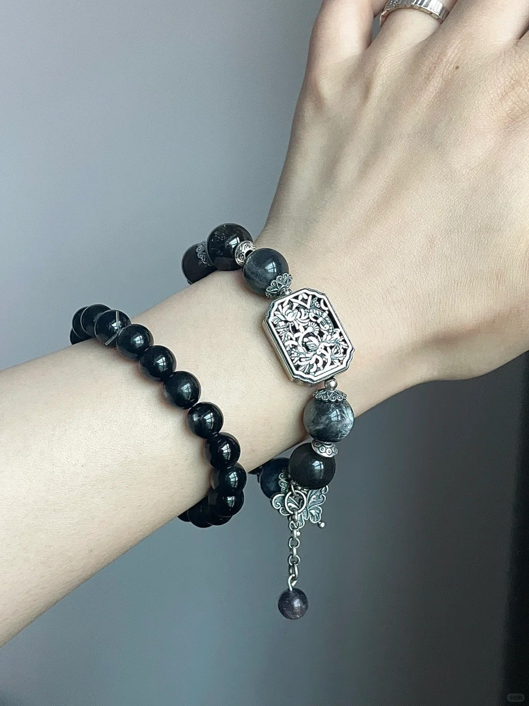 Vintage Silver Plaque Bracelet on Wrist, Hawk-Eye Stone & Silver Charms Match, Water-Metal Energy Shows Tibetan Protection Style