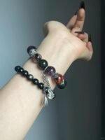 Layered Jiangzi multi-stone bracelet, Xiu jade plaque with colorful beads, earth-fire-metal energy on wrist