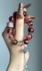Black Gold Super Seven & Red Rutilated Quartz Bracelet Display, Water-Metal Energy Shows Mystic Balance