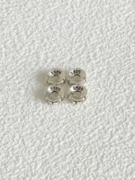 Close-up of S925 silver wave-pattern spacer, vintage design matching water-metal, energy gathered in details