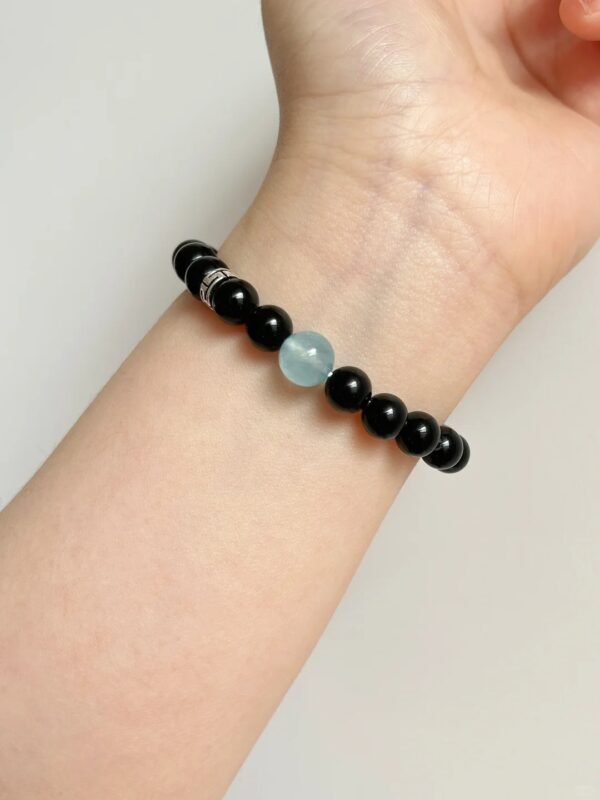 Aquamarine & obsidian bracelet on wrist, S925 silver wave-pattern spacer, water-metal energy on the wrist