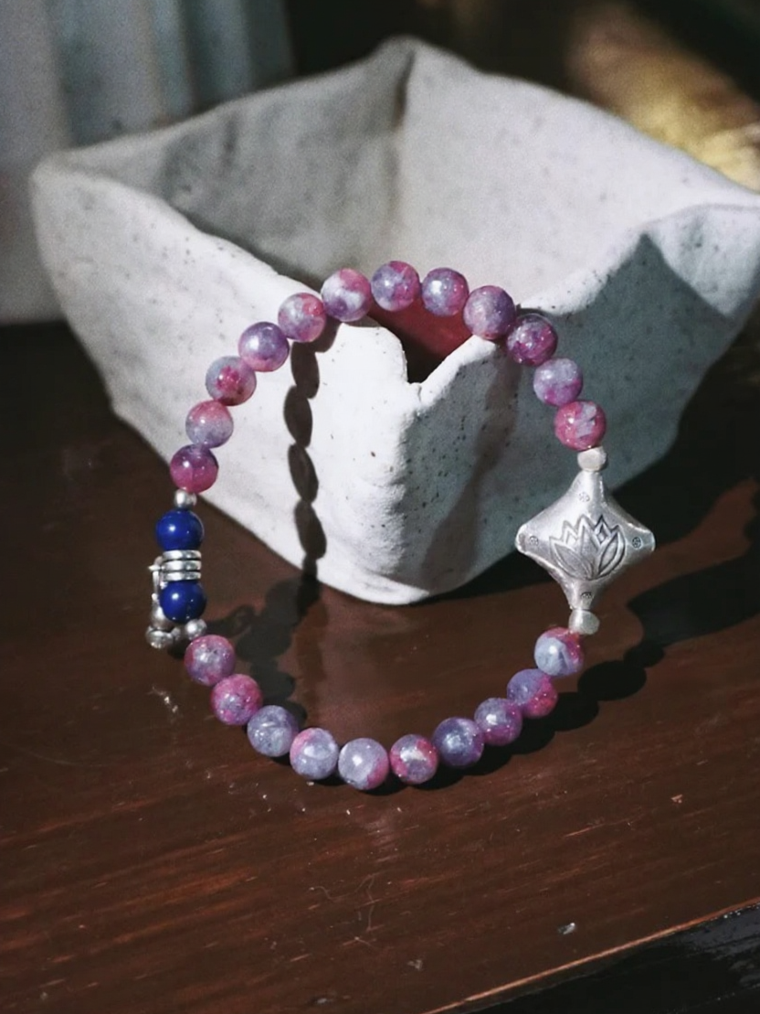 Flatlay of Plum Tourmaline Bracelet, Lapis Lazuli & Vintage Silver Mix, Wood-Water-Metal Energy Shows Minimalist Luxury