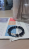 Golden obsidian men’s bracelet on newspaper, 999 silver pixiu charm, water-metal energy for wealth