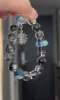 Multi-angle of Herkimer Diamond & Devil’s Blue Aquamarine Bracelet, Devil Eye Silver Charm, Water-Metal Energy Shows Illusion-Breaking