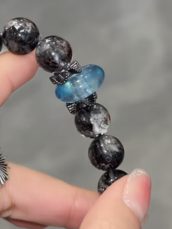 Detail of Herkimer Diamond & Devil’s Blue Aquamarine Bracelet, Devil’s Blue Texture, Devil Eye Charm Shows Balance Philosophy