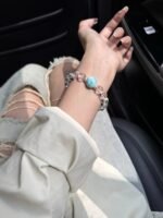 Display of Larimar & Clear Quartz Bracelet, Larimar’s Sea-Like Patterns, Quartz’s Luster, Water-Gold Energy Shows Spiritual Awakening