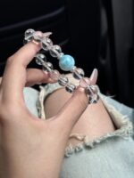 Detail of Larimar & Clear Quartz Bracelet, Larimar-Silver Connection, Quartz’s Icy Translucency, Water-Gold Energy Hides Spiritual Whispers