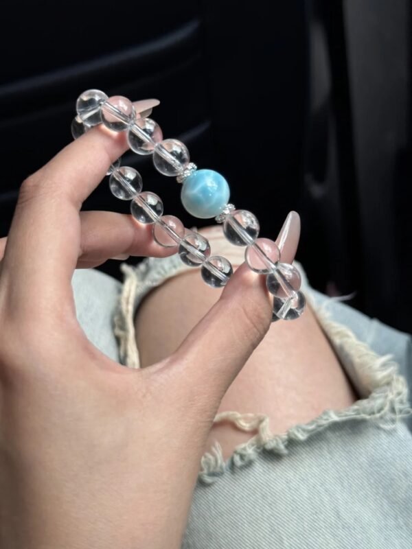 Detail of Larimar & Clear Quartz Bracelet, Larimar-Silver Connection, Quartz’s Icy Translucency, Water-Gold Energy Hides Spiritual Whispers