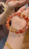 Held Red Fire Quartz & Silver-Gold Bracelet, Unique Patterns Show Niche Elegance, Fire-Gold Energy Boosts Fate Breakthrough