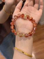 Detail of Red Fire Quartz & Silver-Gold Bracelet, Crown/Flower-Shaped Gold Accents, Fire-Gold Energy Hides Transformation Whispers