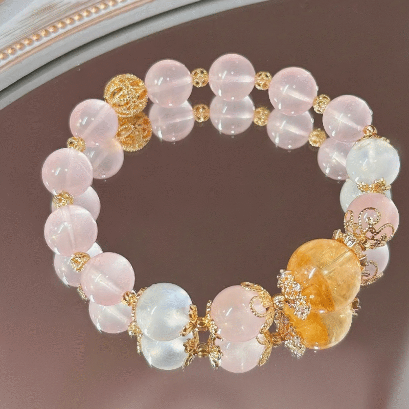 Display of Rose Quartz Bracelet, Multi-Gem Harmony, Earth-Fire-Water-Gold Empowers Gentle Fate