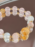 Display of Rose Quartz Bracelet, Multi-Gem Harmony, Earth-Fire-Water-Gold Empowers Gentle Fate