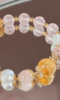 Display of Rose Quartz Bracelet, Multi-Gem Harmony, Earth-Fire-Water-Gold Empowers Gentle Fate
