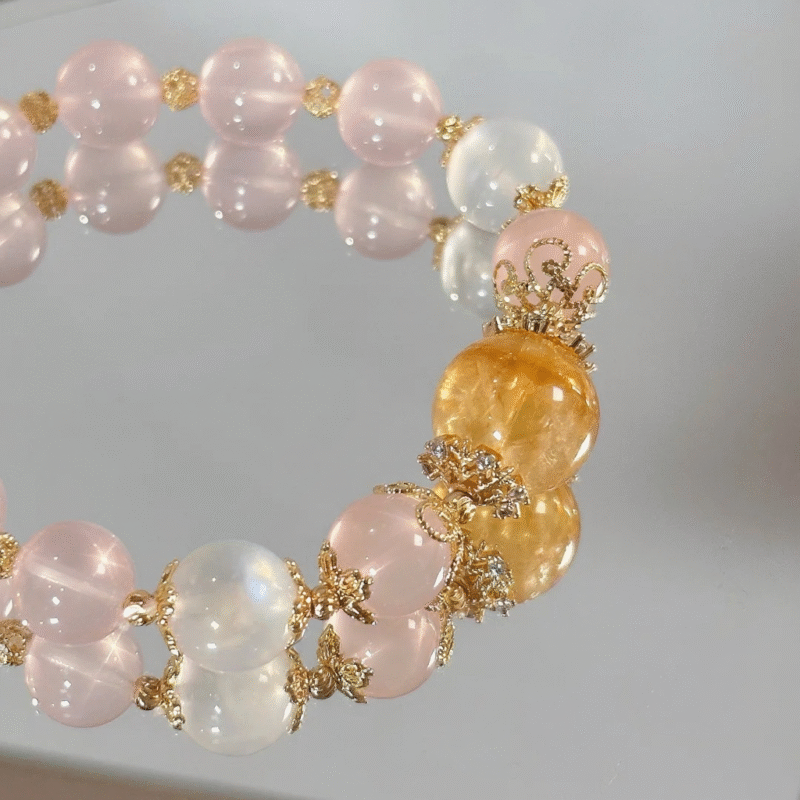 Detail of Rose Quartz Bracelet, Silver-Gold Hollow Accents, Earth-Fire-Water-Gold Hides Gentle Whispers