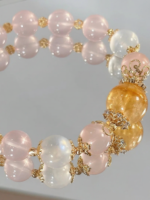 Detail of Rose Quartz Bracelet, Silver-Gold Hollow Accents, Earth-Fire-Water-Gold Hides Gentle Whispers