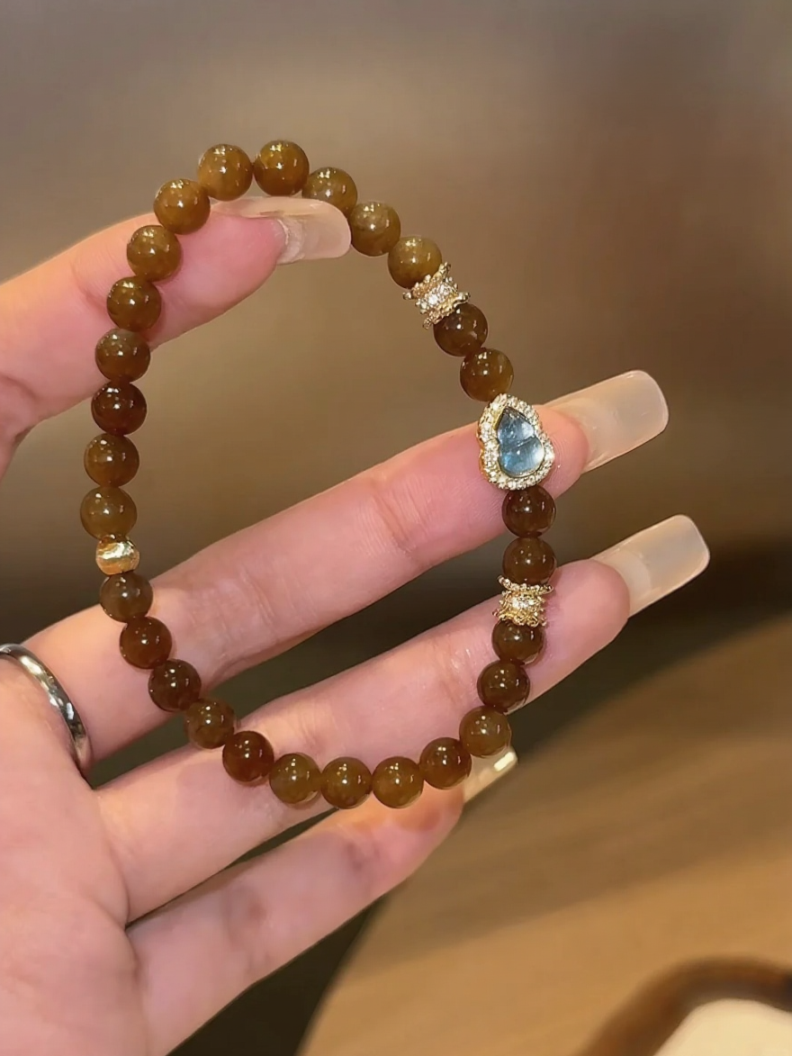 Detail of Nephrite Sugar Jade & Aquamarine Gourd Bracelet, Brown-Oily Sugar Jade, Aquamarine Gourd with Silver-Gold Plating, Earth-Water Energy Shows Gentle Protection