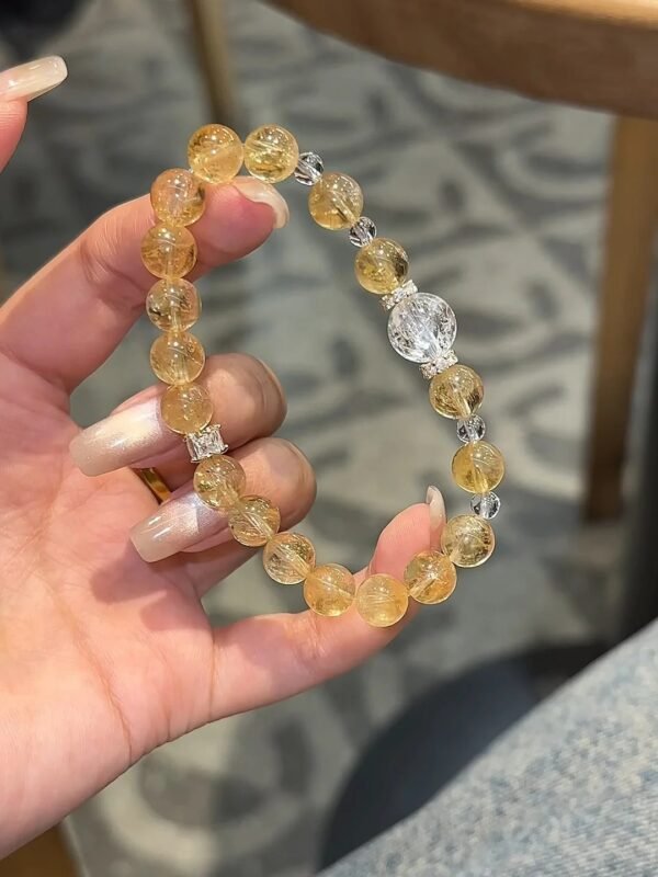 Held Brazilian High-Clarity Citrine & Clear Quartz with Silver Bracelet, Citrine’s Bulb-Like Glow, Quartz’s Purity, Fire-Gold Energy (Azeztulite-Inspired) Shows Creative Edge