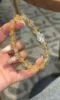 Held Brazilian High-Clarity Citrine & Clear Quartz with Silver Bracelet, Citrine’s Bulb-Like Glow, Quartz’s Purity, Fire-Gold Energy (Azeztulite-Inspired) Shows Creative Edge