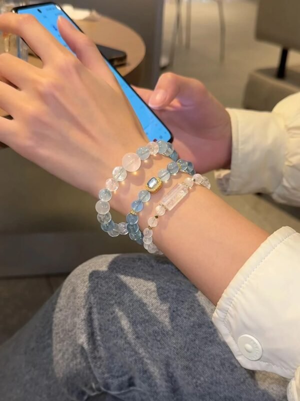 Display of Multi-Aquamarine Bracelet, Blue Flash of Blue Moonstone, Water Energy Anchors Mental Order