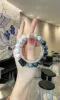 Held Howlite & Hawk’s Eye Bracelet, 10mm Beads, Earth-Fire-Water-Metal Shows Ink-Wash Awakening