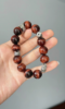 Detail of Red Tiger Eye "Eternal Bliss" Bracelet, Tiger Eye Texture & Silver, Fire-Metal Cycle Drives Courage