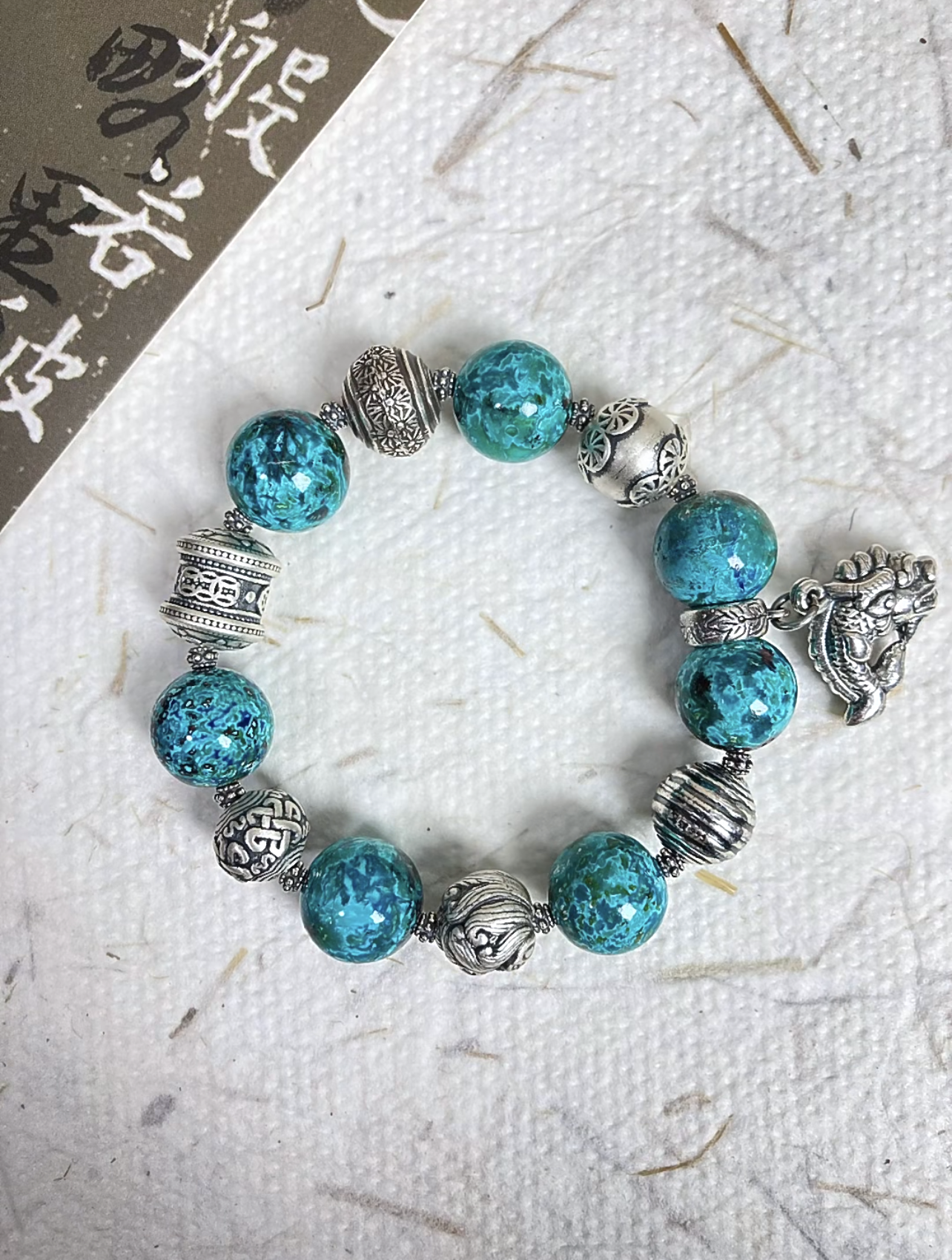 Wearing Display of Phoenix Pine Bracelet, Silver & Stone Match, Wood-Metal Protection Manifestation