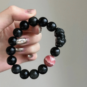 Detail of Obsidian Bracelet, Pixiu Carving & Rhodochrosite, Earth-Fire Protection