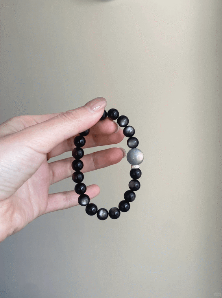 Close-Up of 8mm Silver Obsidian Bracelet, Silver Sheen Reveals Water Energy Code