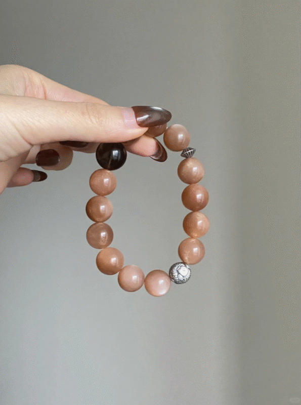 Hand-Holding Orange Moonstone Bracelet, Orange Glow, Smoky Quartz & Silver Resonance, Fire-Earth-Metal Energy Manifests