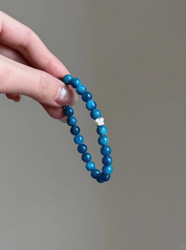 Close-Up of Blue Apatite Bracelet, Blue Glow Reveals Water-Metal Code