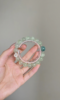 Holding Prehnite & Monet Crystal Bracelet, Wood Energy Transforms