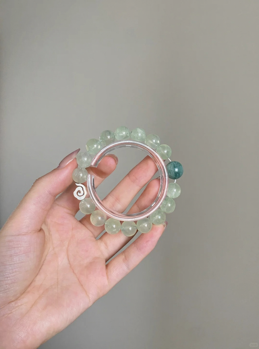 Holding Prehnite & Monet Crystal Bracelet, Wood Energy Transforms