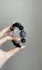 Holding Silver Obsidian × Clear Quartz Bracelet, Black-Silver Glow Hides Letting-Go Code
