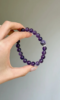 Close-Up of 10mm Amethyst Bracelet, Texture Reveals Fire Energy Code