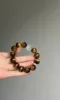 Close-Up of 14mm Yellow Tiger's Eye Bracelet, Tiger Stripes Reveal Earth Energy Code