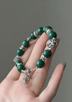 Close-Up of Malachite Beads & Silver Details, Wood Energy Flows to Awaken Vitality