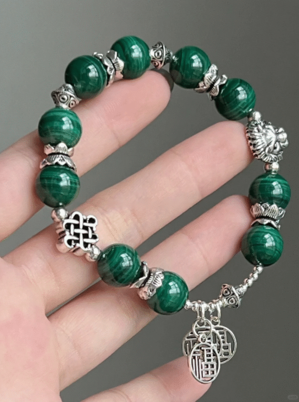 Hand Displaying Malachite × Silver Bracelet, Green Veins & Silver Totems, Wood-Water-Gold Energy Manifests