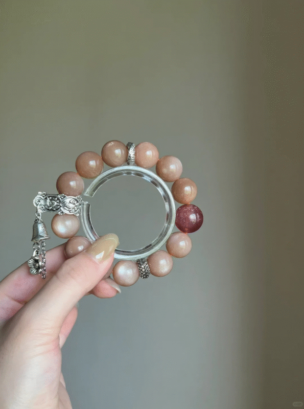 Hand Displaying Orange Moonstone × Strawberry Quartz × Silver Bracelet, Fire-Metal Energy Manifests Luck