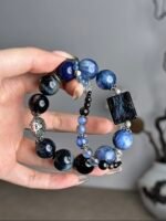 Hand Displaying 14mm Multi-Blue Gem Bracelet (Pietersite Square, Pietersite Round), Water-Metal-Earth Energy Activates Creative Field