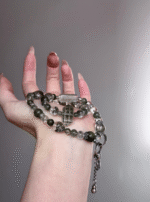 Hand Touching Green Tourmaline Quartz Beads, Fuzzy Glow Holds Vitality