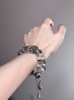 Hand Displaying Layered Green Phantom Bracelet, Columnar Phantom & Rutilated Quartz Sync
