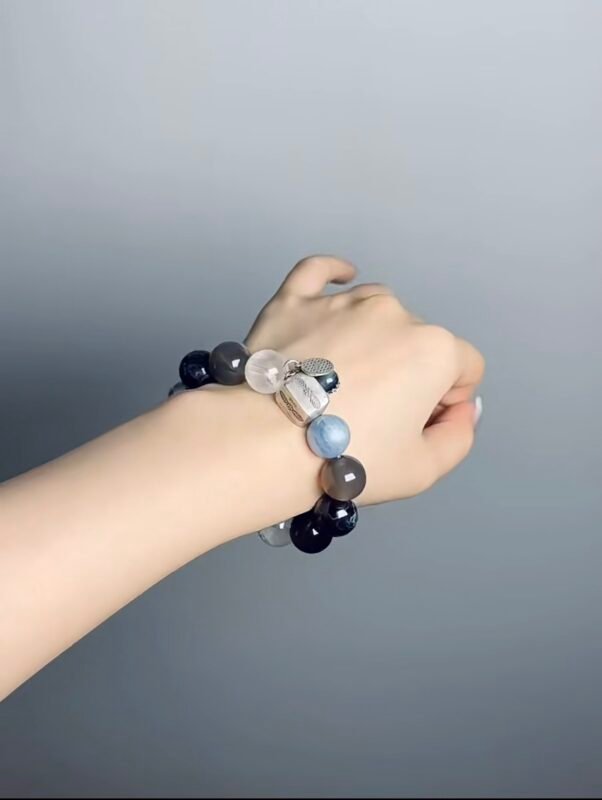 Close-Up of Silver Fish Pendant, Metal Veins Carve Protection Spells, Water-Metal Cycle Manifests