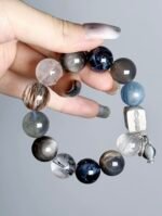 Hand Displaying Earth 2.0 Blue Crystal Bracelet (Kyanite, Aquamarine), Water-Metal Energy Awakens Cosmic Connection