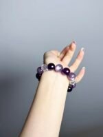 Hand Displaying Lepidolite Details, Fire Veins Ignite Creative Inspiration